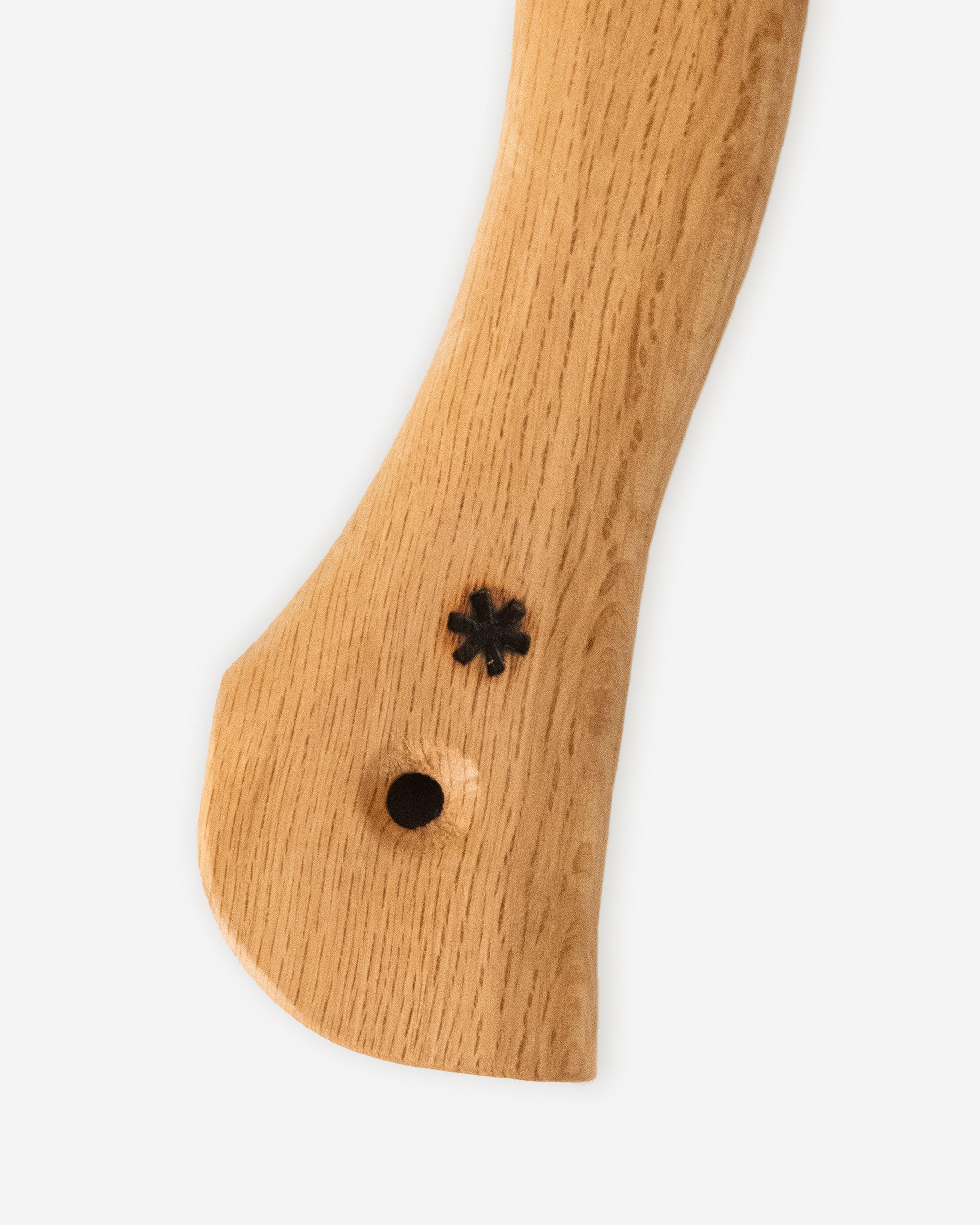 Close up of the handle on a  traditional hatchet made by Snow Peak