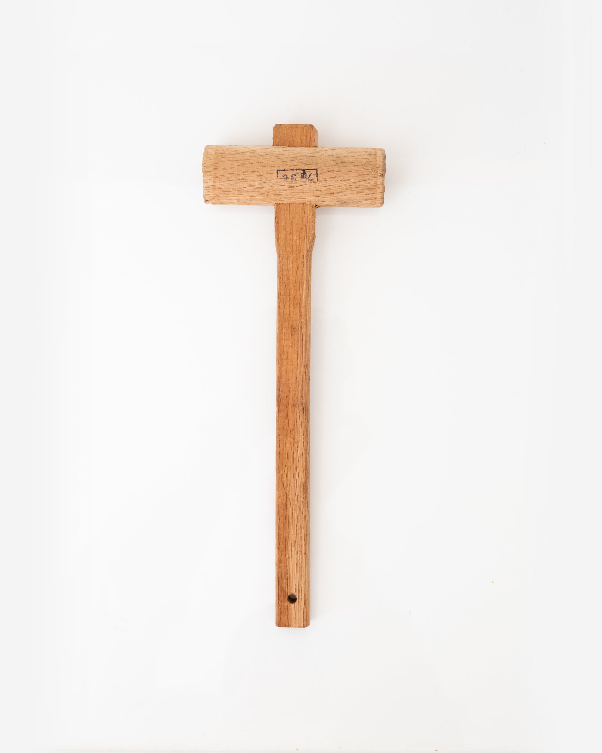 Wooden hammer from Snow Peak for tent pegs